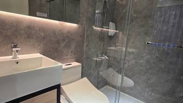 Superior Quadruple Room, 2 Double Beds, Private Bathroom | Bathroom | Shower, hair dryer, towels, soap