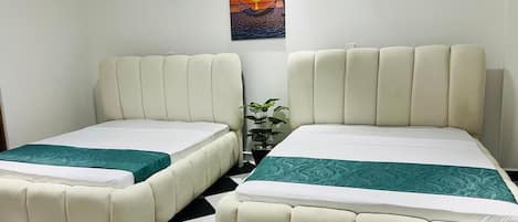 Deluxe Apartment, Balcony, Garden View | Laptop workspace, WiFi (free), individually decorated