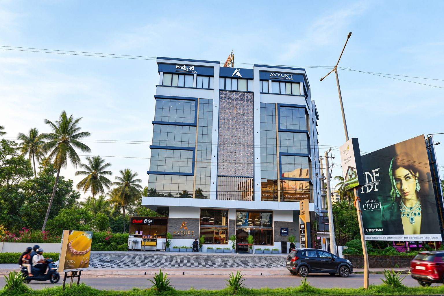 A multi-story hotel with a modern facade, large windows, and a prominent entrance.