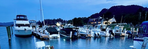 Luxury boutique floating yacht suite with marina amenities close to beach & town