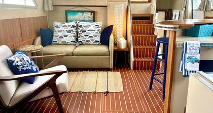Luxury boutique floating yacht suite with marina amenities close to beach & town