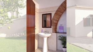 Een douche, een bidet, handdoeken