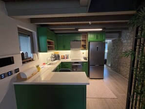 Luxury Duplex, City View | Private kitchen | Highchair - Center Stone Guest House (Gokceada)