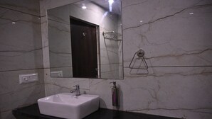 Standard Double Room | Bathroom | Towels, soap, shampoo, toilet paper - Ramanjaneya Eecutive Hotel Udupi (Samudrapur)
