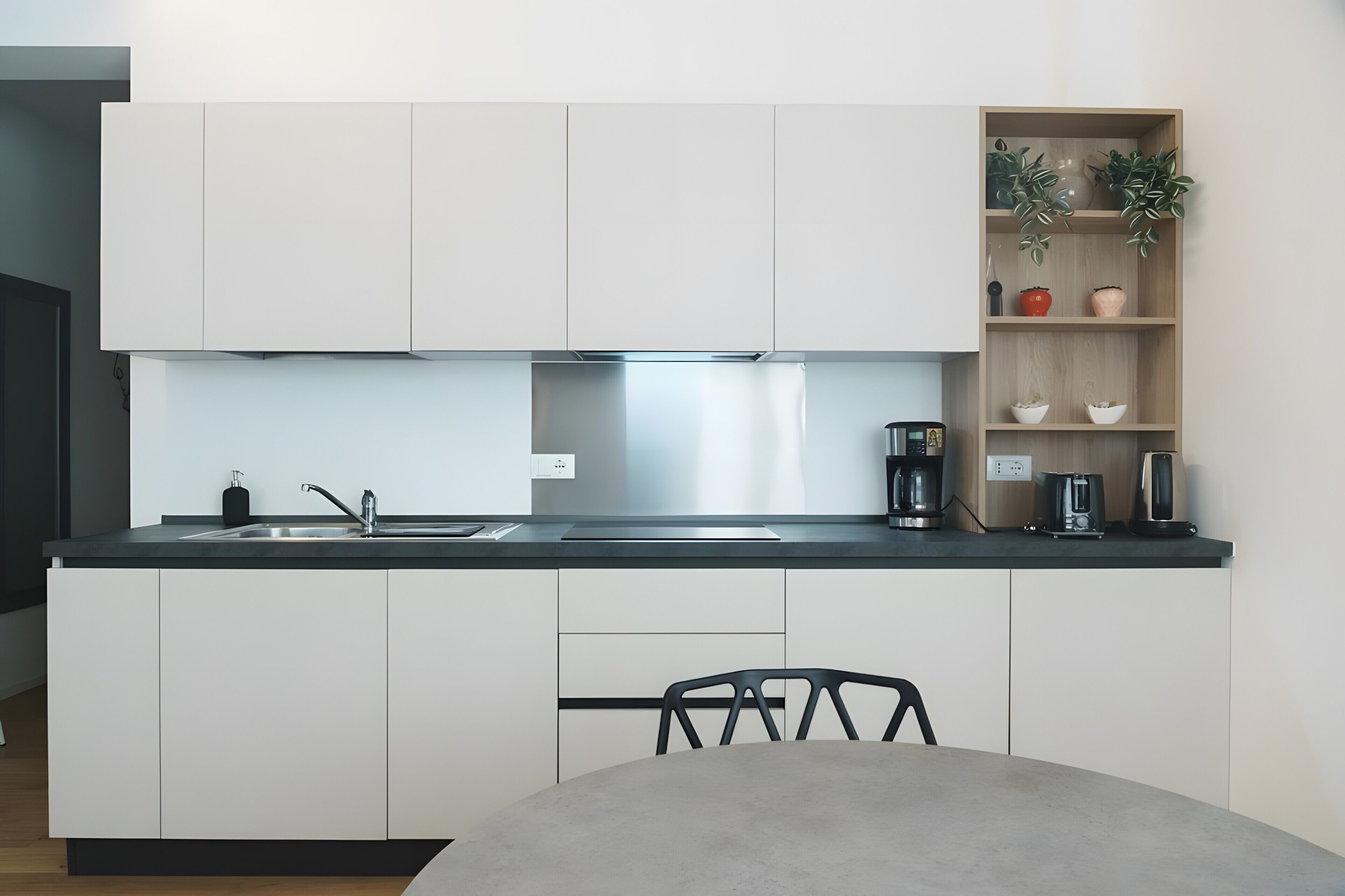 Coffee/tea maker, fridge, stovetop, dishwasher