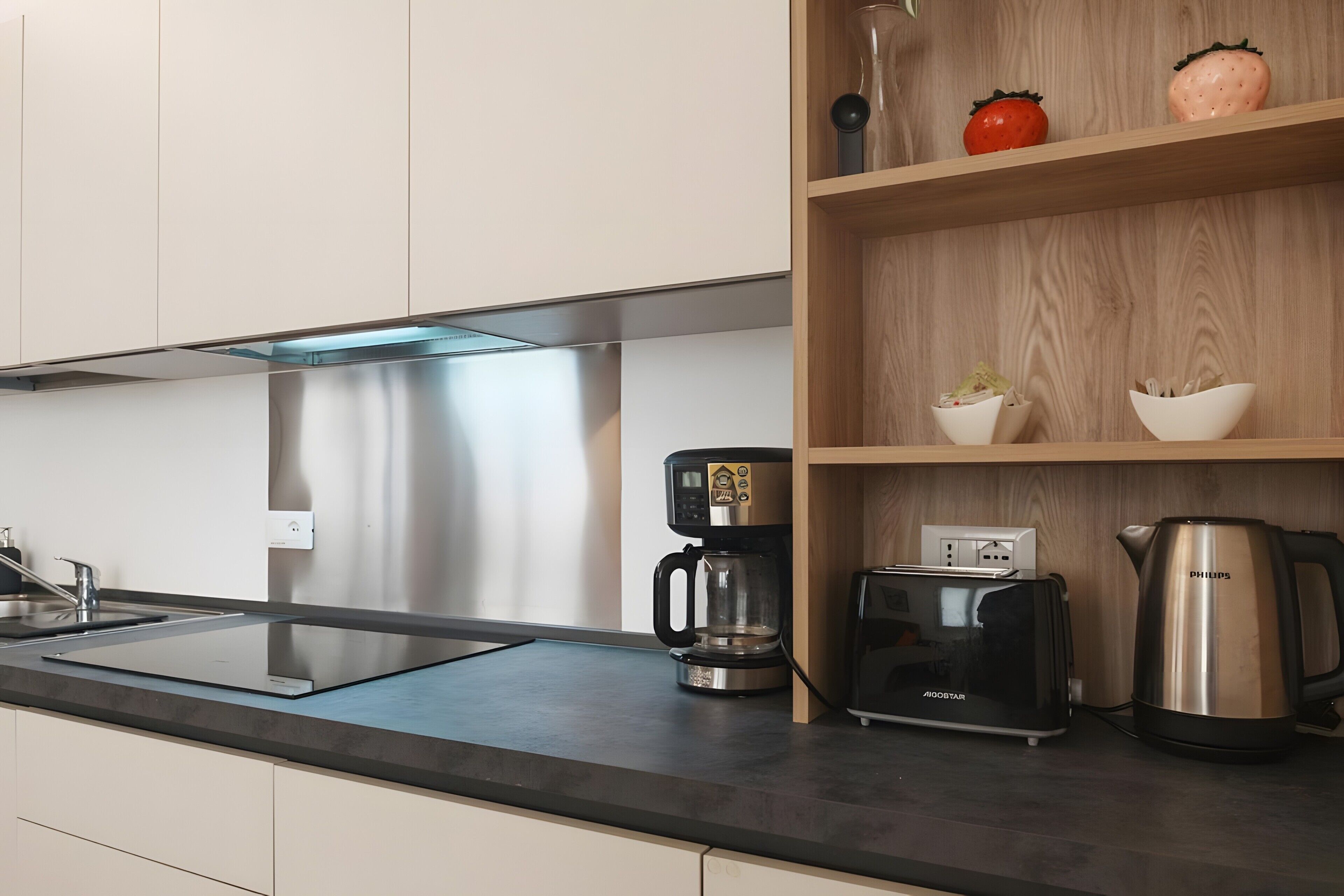 Coffee/tea maker, fridge, stovetop, dishwasher