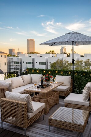 Outdoor dining - 3 Luxury Homes • 12BR • 3 Rooftops • Sleeps 30 (Houston)