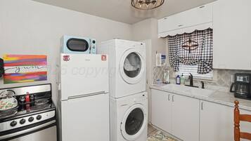 Coffee/tea maker, fridge, microwave, oven