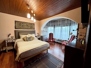 Chambre Double Deluxe, vue jardin | Coffres-forts dans les chambres, rideaux occultants, Wi-Fi gratuit