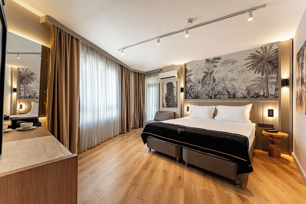 Habitació doble o amb dos llits individuals Deluxe | Caixa forta a l'habitació i espai de treball apte per a portàtils 