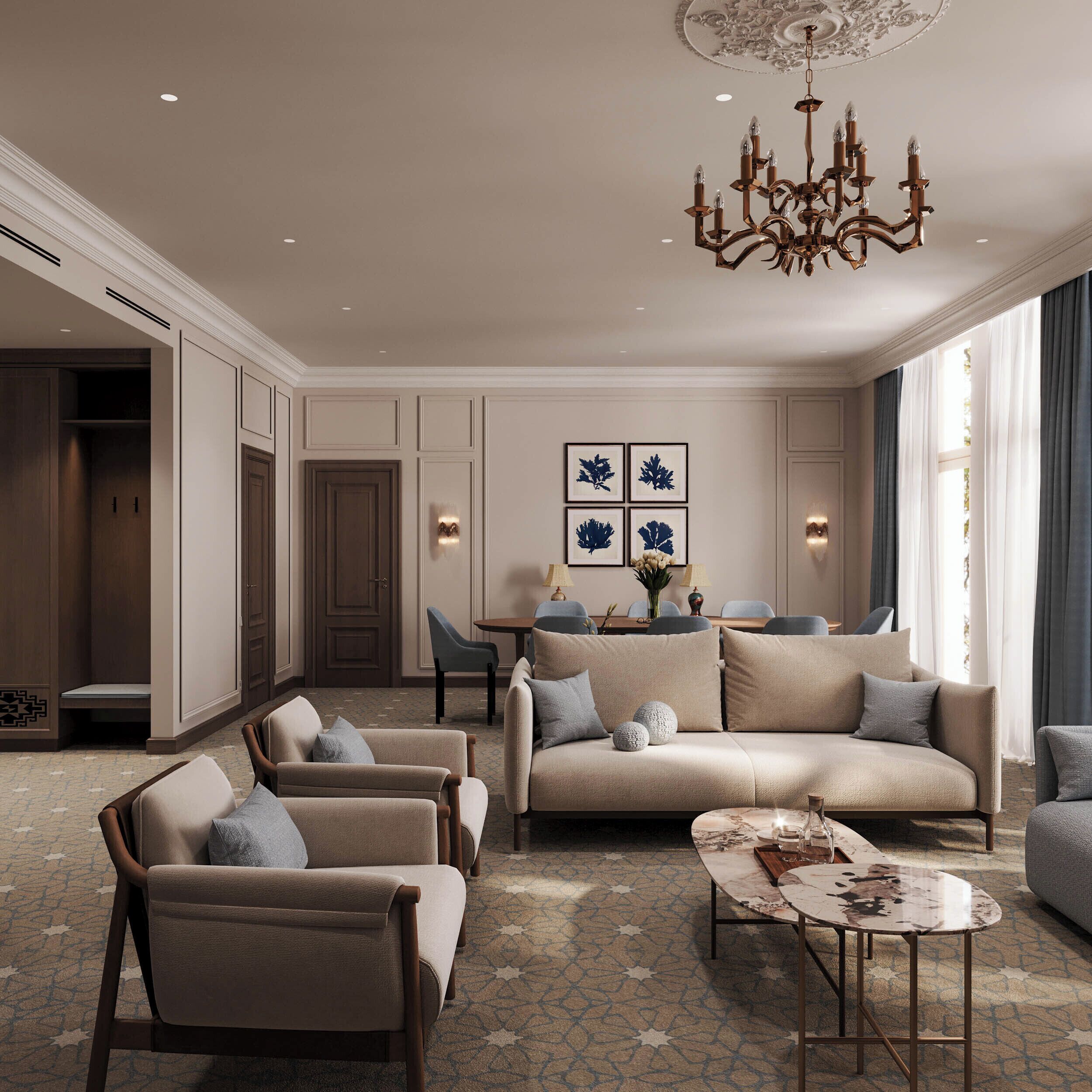 A spacious living room with a sofa set, armchairs, a coffee table, and a chandelier.