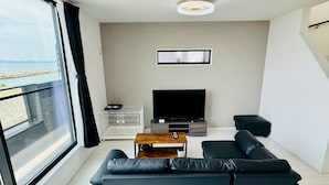 Condo luxueux, vue sur l’océan | Aire de séjour
