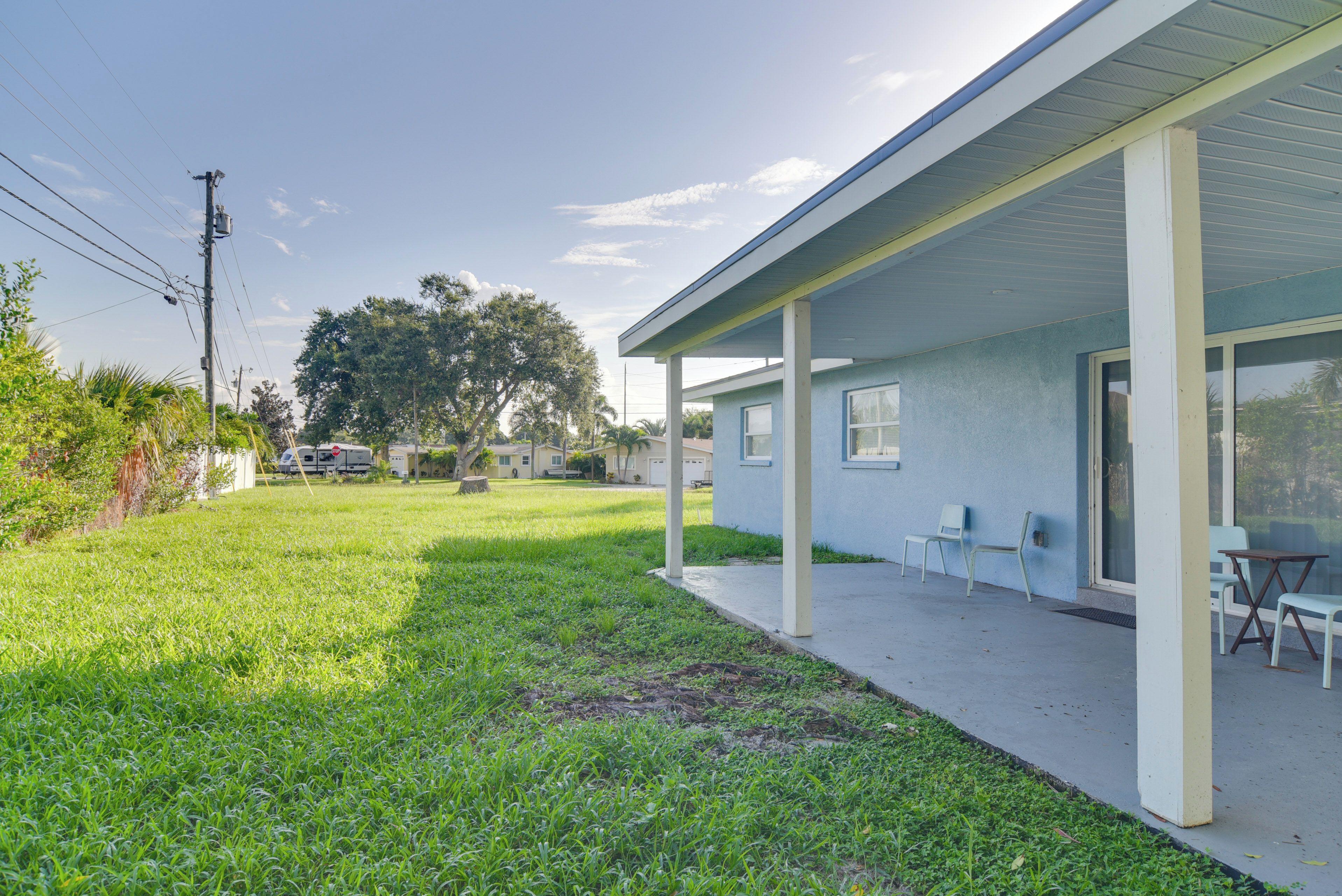 A single-story building with a covered patio area.