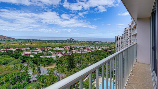 A residential area with a view of the ocean and a mountain in the distance. - 1 Mi to Makaha Beach: 10th-floor Condo w/ Views (Waianae)