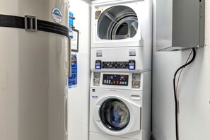 A stacked washer and dryer unit with control panels and a water dispenser. - King Bed Studio, Free Shuttle to Slopes & Main Street - Moose Mgmt 425 (Park City)