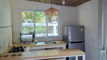 Appartement Deluxe, balcon, vue jardin | Cuisine privée