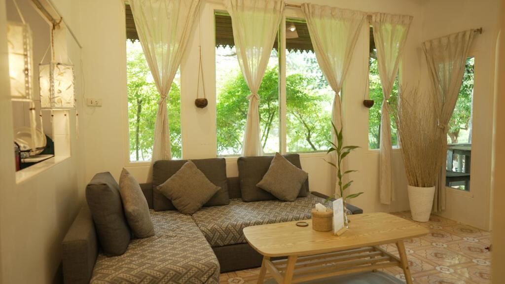 Cottage Deluxe, balcon, vue jardin | Coin séjour