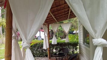 Family Apartment, Balcony, Garden View | Outdoor dining