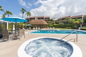 A pool area with lounge chairs, a hot tub, and a gazebo. - Big Island Keauhou Punahele C202 2 Bedroom Condo (Kailua-Kona)