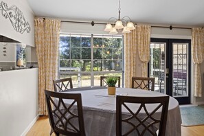 Dining - Single-story Navarre home sleeping 9 across 4 bedrooms, just minutes from sugar-white Navarre Beach. Full kitchen, in-unit laundry, workspace, and a beach bag stocked with towels & life jackets. Perfect for an easy Gulf Coast family escape! (Navarre)