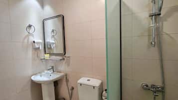 Superior Studio, Balcony, City View | Bathroom | Shower, hair dryer, slippers, towels