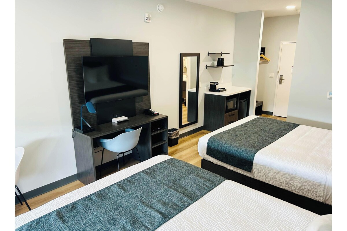 Premium bedding, iron/ironing board, WiFi (free), bed sheets