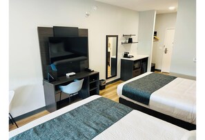 Premium bedding, iron/ironing board, WiFi (free), bed sheets