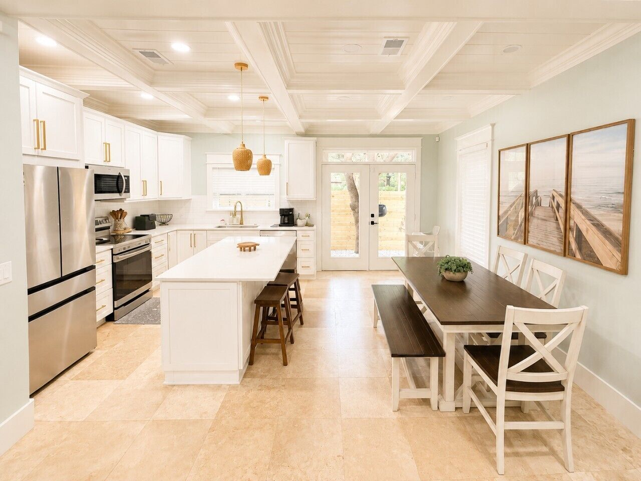 Gather around the farmhouse dining table, open to the chef`s kitchen — the perfect spot for family meals.