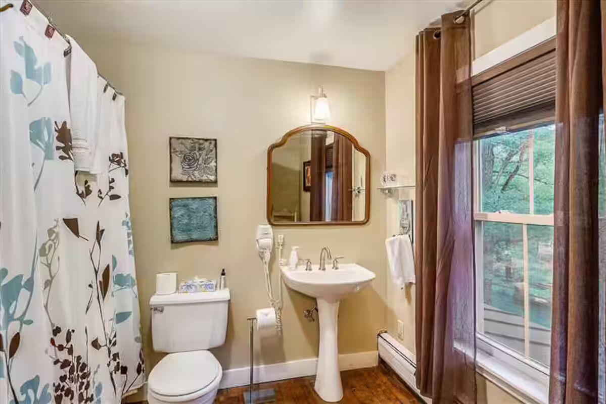 Shower, towels, soap, toilet paper
