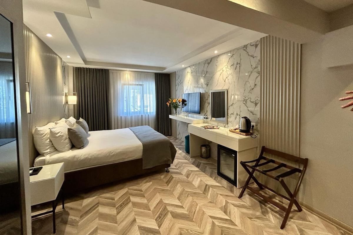 Habitación Deluxe con 1 cama matrimonial o 2 individuales | Wifi gratis 