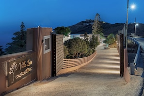 A gated entrance with a sign reading 'Villa Lois.' - Villa Lois, by Estia (Malevizi)