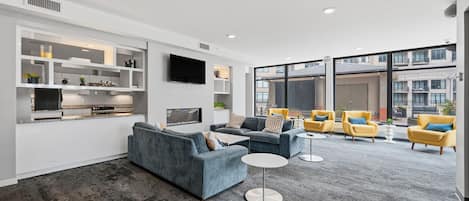 Smart TV, fireplace, books