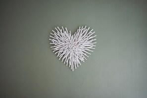 A heart-shaped arrangement of white sticks on a plain wall. - The Alfred 4BR Suite in Redcar | Sleeps 7+Parking (Redcar and Cleveland)