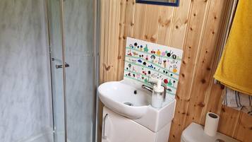 Shower, towels, soap, toilet paper