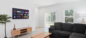Posh 3BR Townhome| Pool | Gym | Close to Beach
