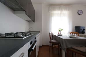 Private kitchen - Reunia apartments (San Giacomo)
