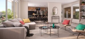 A modern living room with a sofa, armchairs, a coffee table, and a dining area with chairs and a table. - Santa Isabel Santiago by Domus Travels (Santiago)