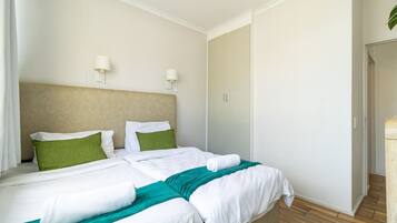 2 bedrooms, desk, iron/ironing board, travel cot