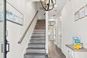 Spacious 3-bedroom, 3.5-bath vacation rental with a private 1-car garage, balcony, fenced backyard and walking distance to the Riverwalk area - River District Residence | Walk to Armature Works | 3BR Townhome with Garage & Private Yard (Tampa)