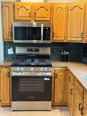 Coffee/tea maker, fridge, microwave, oven - Waterfront retreat set on private 4 acres with beautiful views of the river. (Cedar Rapids)