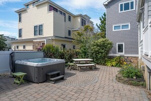 A residential area with a patio, hot tub, and outdoor seating. - WATCH THE SUNSET FROM YOUR Beautiful 5-bedroom home with AC Beach Haven Crest (Beach Haven)