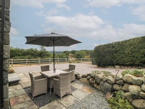 Outdoor dining - THE BYRE, pet friendly, character holiday cottage in Tal-Y-Bont (Conwy)