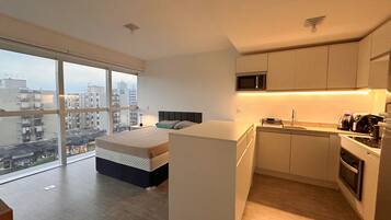 Coffee/tea maker, fridge, microwave, oven