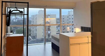 New Modern Studio Apartment with Garage and Great Location