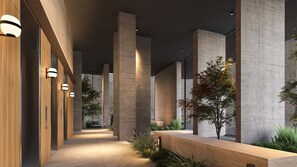 A modern interior with concrete pillars, wooden paneling, and a bench.