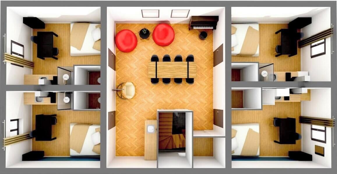 Distribución de una habitación de hotel con cama, zona de estar y una pequeña cocina.