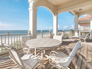 Outdoor dining - A Sandcastle! Beach Front, Hot Tub, Community Pool, Beach Gear Credit! (St. George Island)