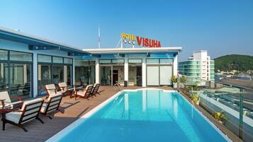 Outdoor pool, open 6:00 AM to 6:00 PM, sun loungers