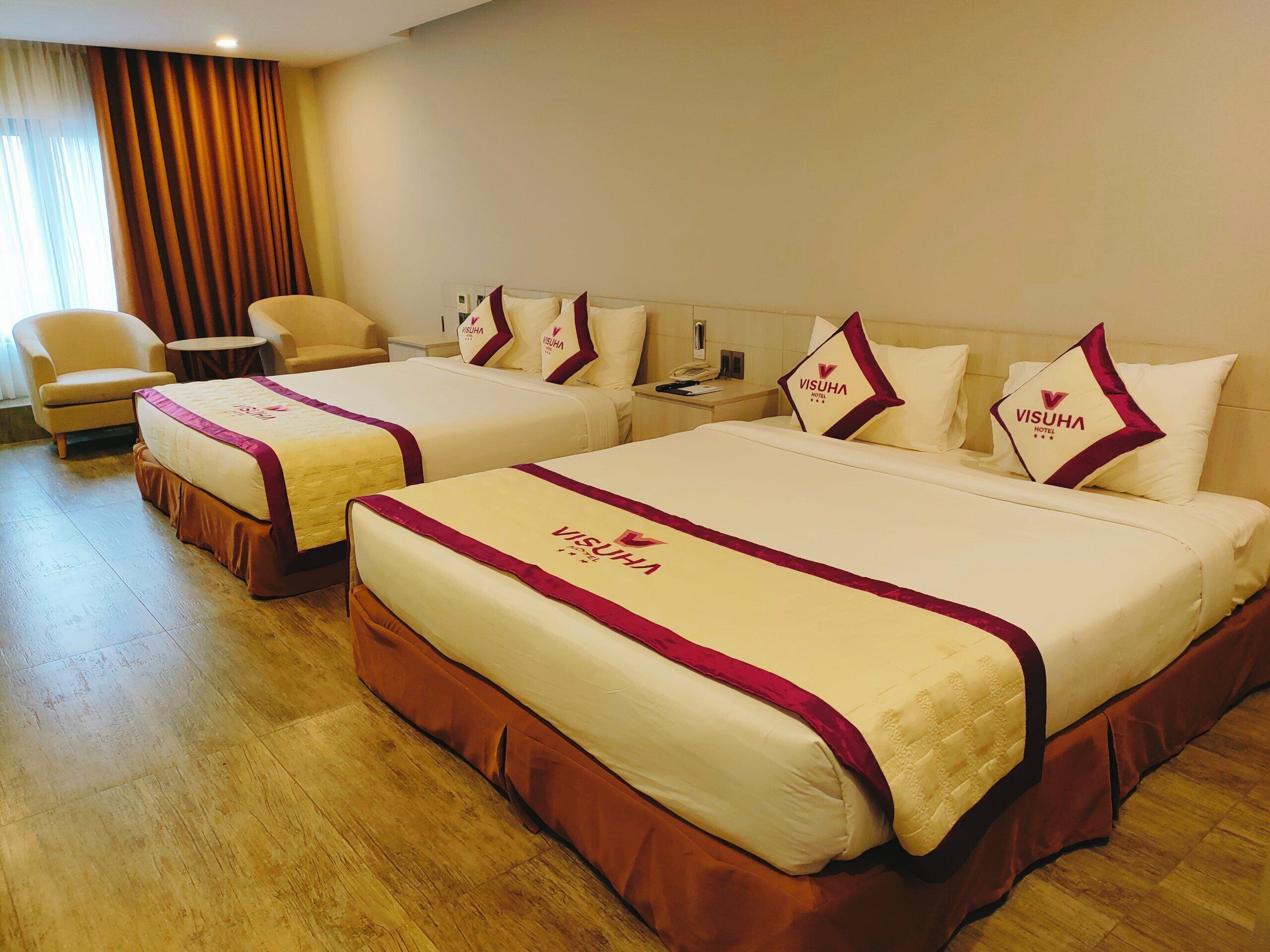 Standard Quadruple Room, City View | In-room safe, blackout drapes, soundproofing