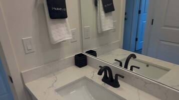 Hair dryer, towels, soap, toilet paper